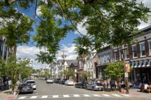 Clinton, USA - May 26, 2025. People walking on sidewalk in downtown historic Clinton, New Jersey, USA